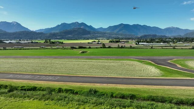 Airport Road Of Chilliwack Municipal Airport In British Columbia, Canada - aerial drone shot