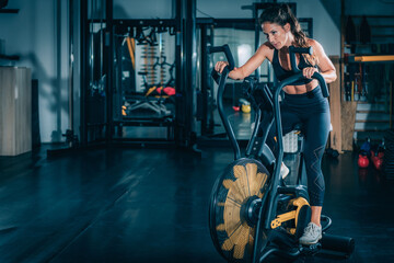 Obraz na płótnie Canvas Air Bike exercising in the gym.