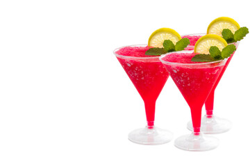 Three delicious summer slushie cocktails each garnished with a slice of lime and a sprig of mint leaves viewed isolated on white background. Summer and Party drink Concept.