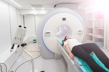 Medical CT or MRI Scan in the modern hospital laboratory. Interior of radiography department. Technologically advanced equipment in white room. Magnetic resonance diagnostics machine