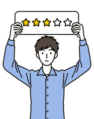 星3つの札を持つ男性