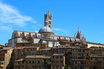 View of the old renaissance city of Siena, in the background the Cattedrale di Santa Maria Assunta Tuscany, Italy