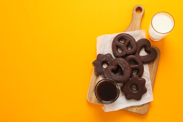 Concept of tasty bakery, gingerbread cookies in chocolate, space for text