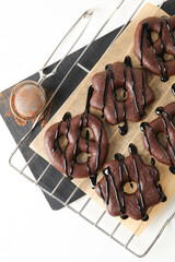 Concept of tasty bakery, gingerbread cookies in chocolate, top view