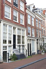 Naklejka premium Amsterdam Prinsengracht Canal Street View with Typical House Facades, Netherlands