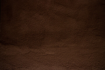 Brown colored abstract wall background with textures of different shades of brown