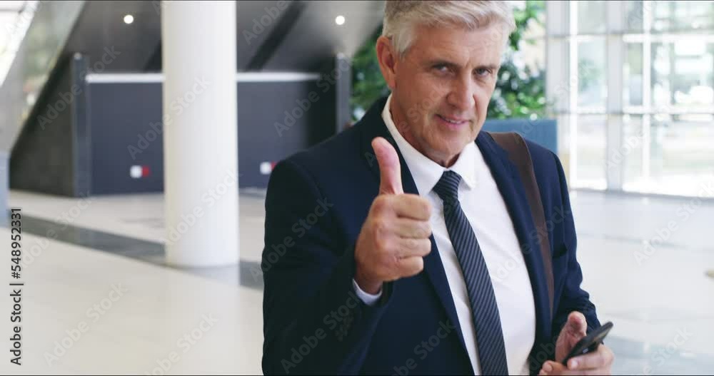 Poster Phone, portrait and thumbs up with senior manager walking through an office for business deal or negotiation. Thank you, communication and success with a man CEO employee on a smartphone on his walk