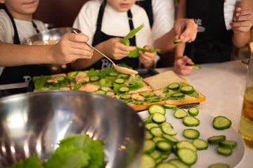 close-up shot. hands holding fresh chicken toast at cooking classes