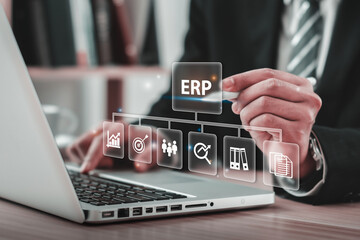 ERP Enterprise Resource Planning Concept  Business people use computers to manage documents in ERP...