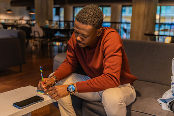 Writing something on the paper while thinking