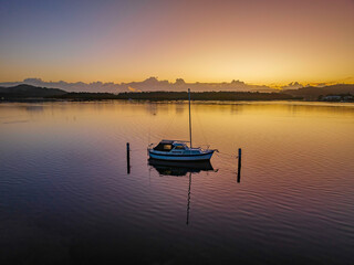 Fototapeta na wymiar Soft and subtle sunrise waterscape over the bay