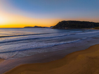 Clear skies aerial sunrise seascape