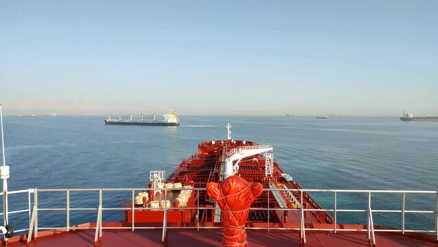 Suez, Egypt - huge container vessel proceeding through the Suez Canal. Time laps
