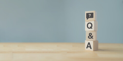 Q and A - an abbreviation of wooden blocks with letters on a gray background. Illustration for...