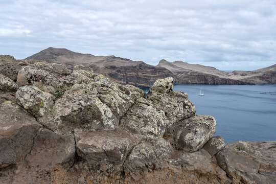 igneous rocks at barren slopes of cove on Atlantic ocean, Baia d Abra, Madeira