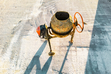 Industrial concrete mixer at a construction site. Mixing concrete and mortar on site. construction...