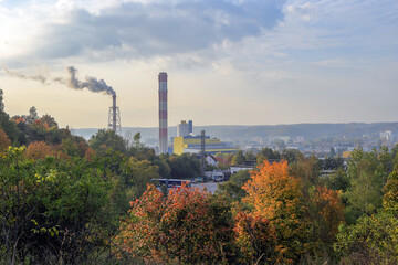 Fototapeta na wymiar View of the smoking chimneys of the power plant in Gdynia, Poland