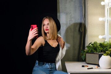 Woman at dressing room mirror