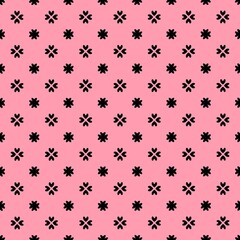 seamless pattern of black dots in pink background 