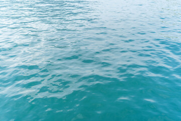 Water texture background, mediterranean ripple wavy light blue water surface, top view, aerial