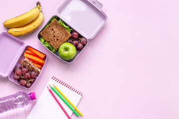 School lunch boxes filled with fruits and vegetables. Healthy meal