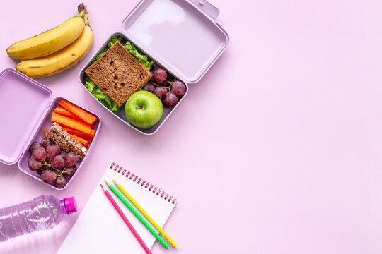 School lunch boxes filled with fruits and vegetables. Healthy meal