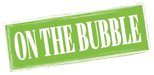 ON THE BUBBLE text written on green stamp sign.