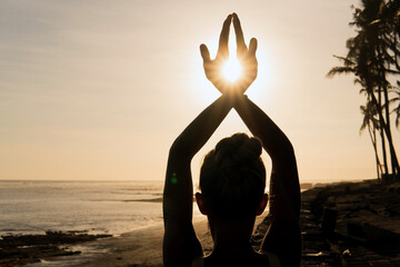 beautiful woman meditating outdoors