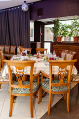 a table in the banquet hall of the restaurant at the celebration