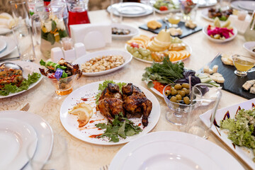 meat and food on the table in the restaurant