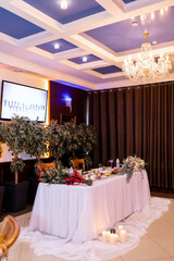 a festive banquet table in a restaurant for weddings, jubilees, birthdays