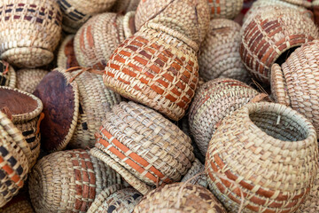 Traditional wicker baskets, exhibited in market shops of the old town Nizwa. Oman. Arabian Peninsula. 