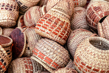 Traditional wicker baskets, exhibited in market shops of the old town Nizwa. Oman. Arabian Peninsula. 