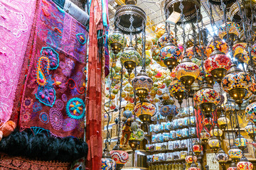 Fototapeta na wymiar Souvenirs exhibited in market shops of the old town Nizwa. Oman. Arabian Peninsula. 