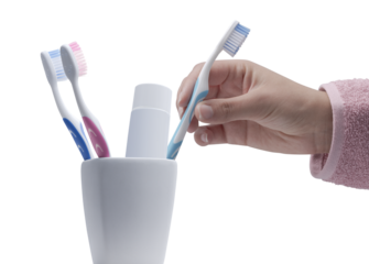 PNG file no background Woman taking her toothbrush in the bathroom