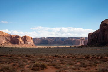 Nice desert landscape with rocky Monument Valley. It's a sunny summer day with blue sky