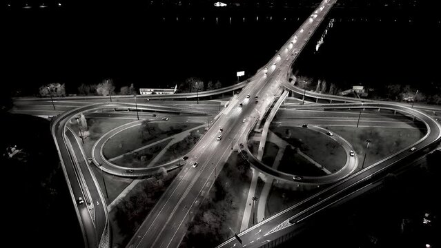 Drone view of the Metropolis Building at night and a street with heavy traffic. Crossroad Night capital of Warsaw Europe Poland