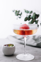 sparkling champagne cocktail with strawberry sorbet - obrazy, fototapety, plakaty