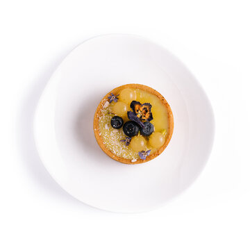 Lemon Curd Mini Tarts On White Plate