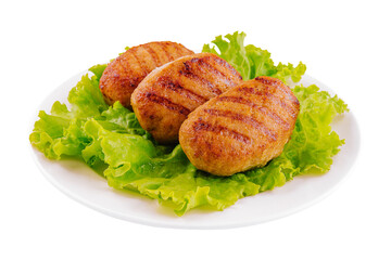 Three cutlets with lettuce on a plate isolated