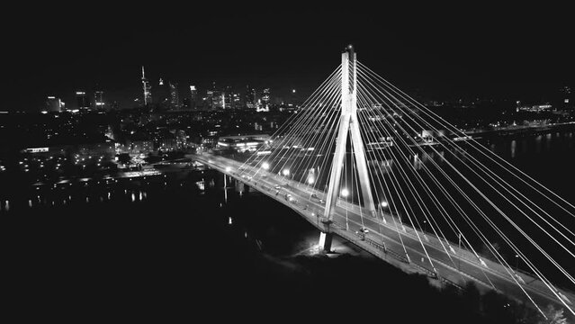 Drone view of the Metropolis Building at night and a street with heavy traffic. Crossroad Night capital of Warsaw Europe Poland
