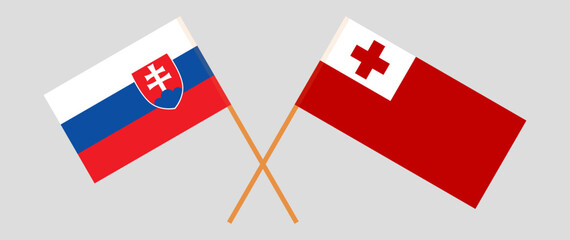 Crossed flags of Slovakia and Tonga. Official colors. Correct proportion