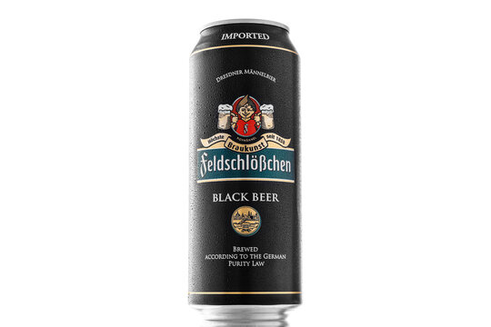 Feldschl&ouml;&szlig;chen Traditional brewing in Dresden since 1858. A can of dark beer on a white isolated background with water drops. MINSK, BELARUS - November 25, 2022