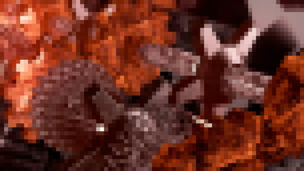 Glowing pixels. Motion.An orange-dark mosaic that moves in animation.