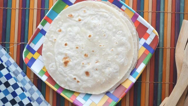 homemade roti chapati on table .