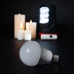 Power outage - the light bulb does not glow, flashlights and candles as sources of light and heat