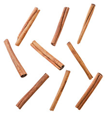 Set of cinnamon sticks cut out on a white background. Isolated