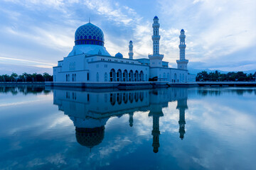 The floating City Mosque, also known as Likas Mosque at Kota Kinabalu, Sabah, Malaysia at dawn just before sunrise.