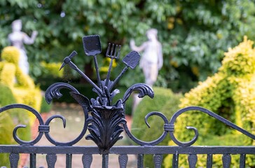 Closeup of an ironwork detail on garden gates at Eythrope Gardens on the Waddesdon Manor estate