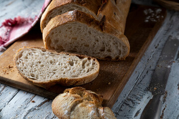 Sliced white wheat bread on a cutting board